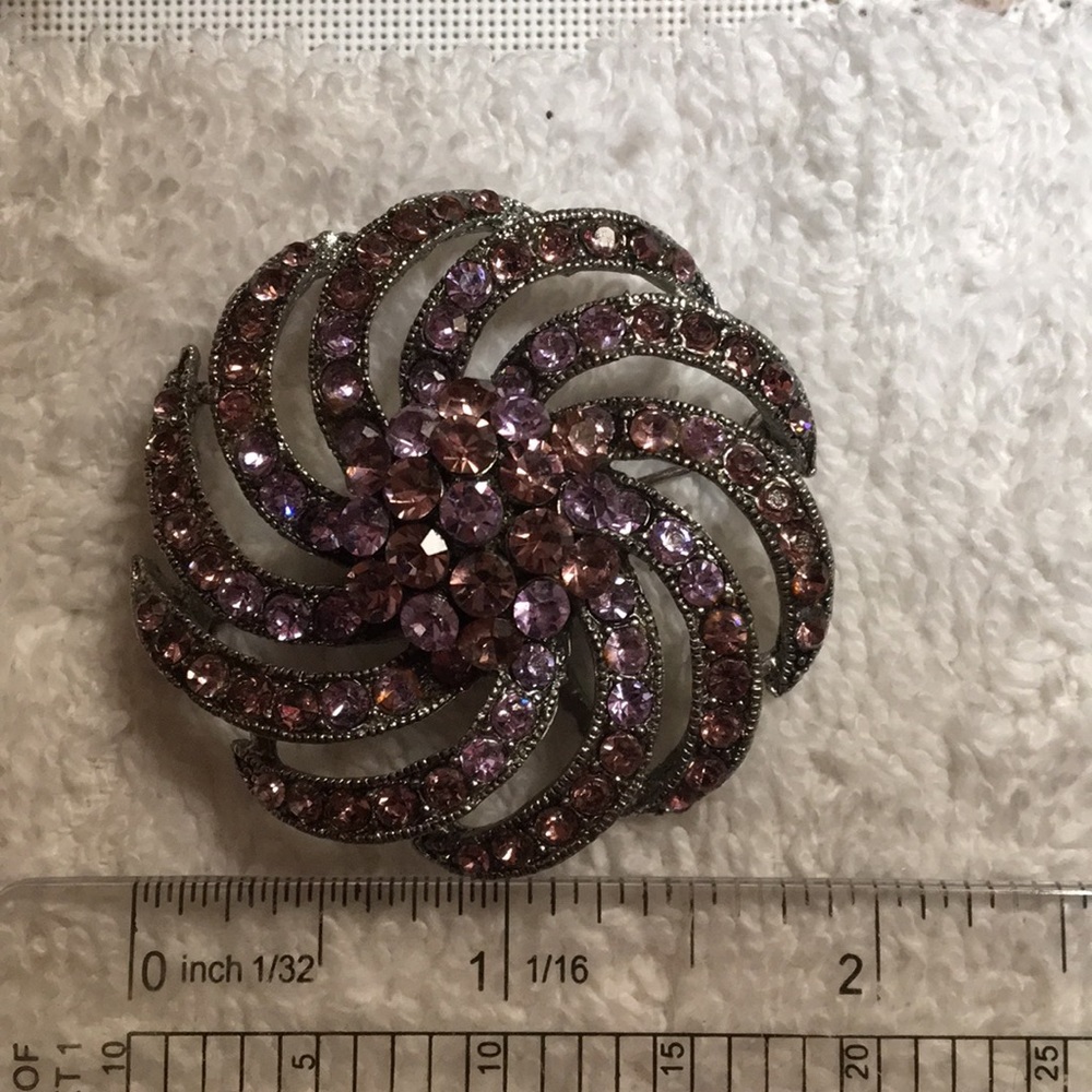 World wind brooch